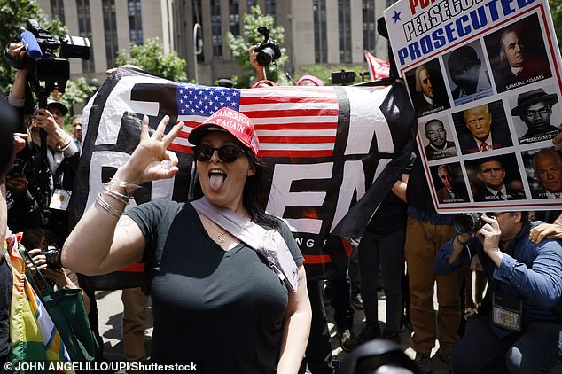 Supporters of former President Donald Trump demonstrate outside the courthouse, where wild scenes resembled a Trump rally.