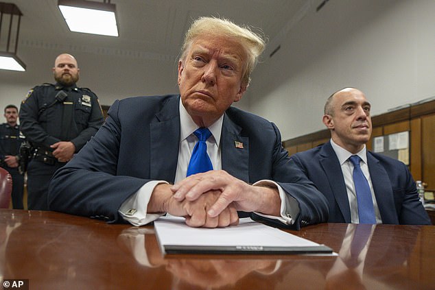 An atmosphere of anxiety filled the area around the court, with the former president waiting patiently inside to learn his fate, photographed during jury deliberations on Thursday.