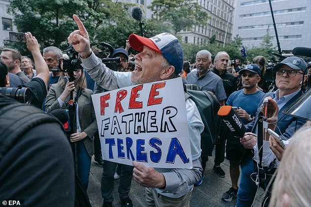 A pro-Trump protester breaks down in tears outside the courthouse after former US President Donald Trump was found guilty.