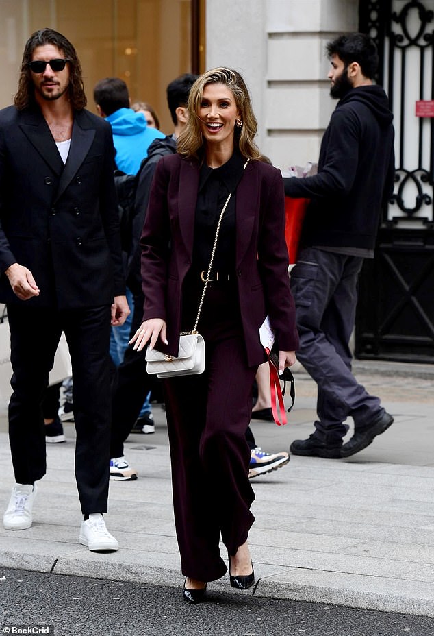 The unlikely couple hit it off when they were spotted mingling in central London alongside Goodrem's fiancé Matthew Copley.