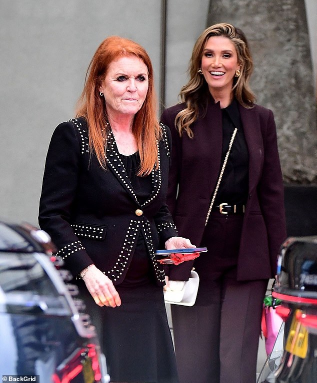 Goodrem, 39, was also smartly dressed for the meeting in a smart maroon jacket and matching pants.