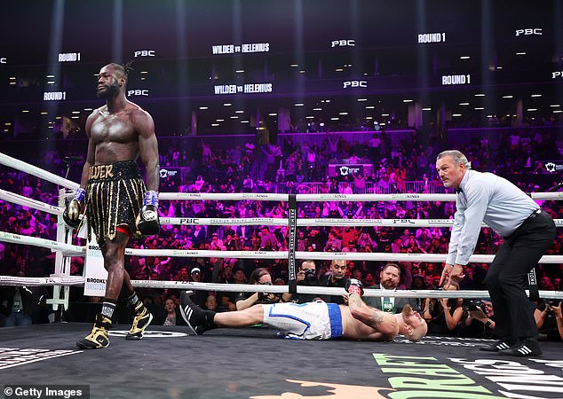 Wilder coolly returns to his corner after his impressive knockout at the Barclays Center.