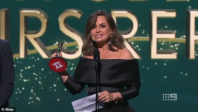 Lisa Wilkinson is pictured giving her Logies speech, which caused Lehrmann's criminal trial to be delayed.