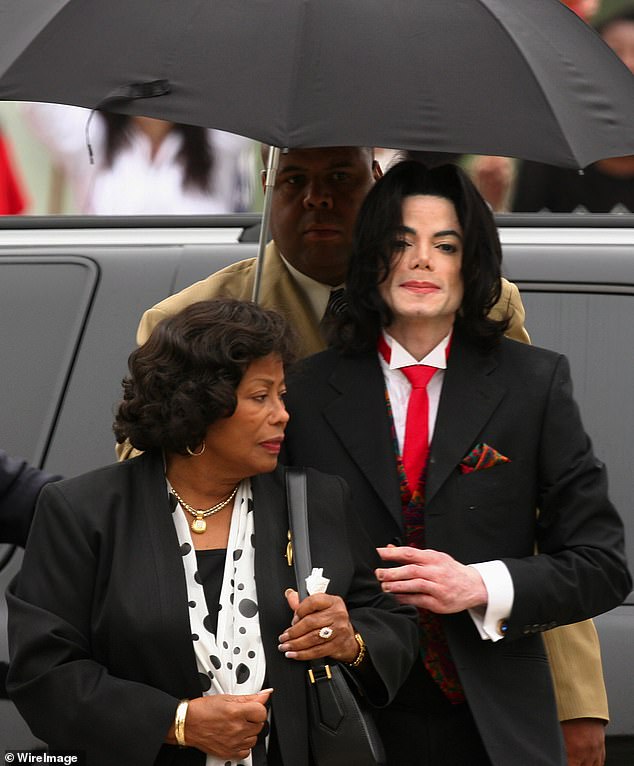 The King of Pop's mother, Katherine, 94, has also been banned from receiving money from the trust; She is seen with Michael in 2005.