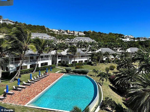 Bath time: The villa overlooks a fabulous pool.