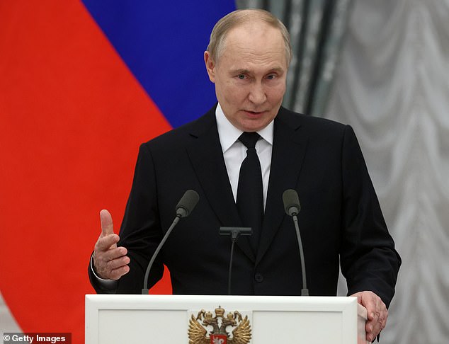 Russian President Vladimir Putin (pictured) speaks during an awards ceremony in the Kremlin