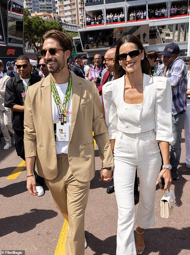 The star and teammate Kevin Trapp shake hands during the Monaco Grand Prix on Sunday.