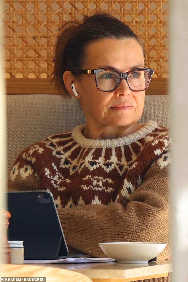 Lisa Wilkinson appears at a coffee shop on Wednesday wearing a $1,600 Celine sweater.