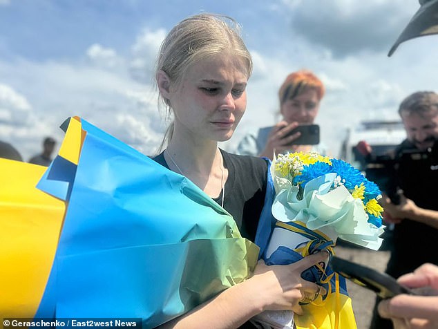 One of the excited returnees today was Ukrainian police officer Maryana Chechelyuk, 24 (pictured), who was feared dead.