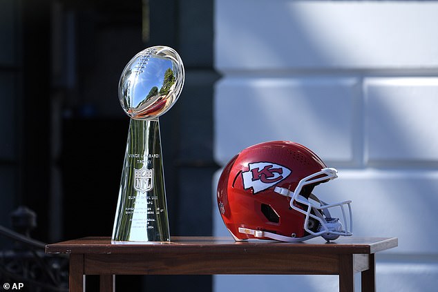 Before the team arrived, the Lombardi Trophy (left) and the Kansas City Chiefs helmet (right) that would be presented to Biden were on a table in the south field.