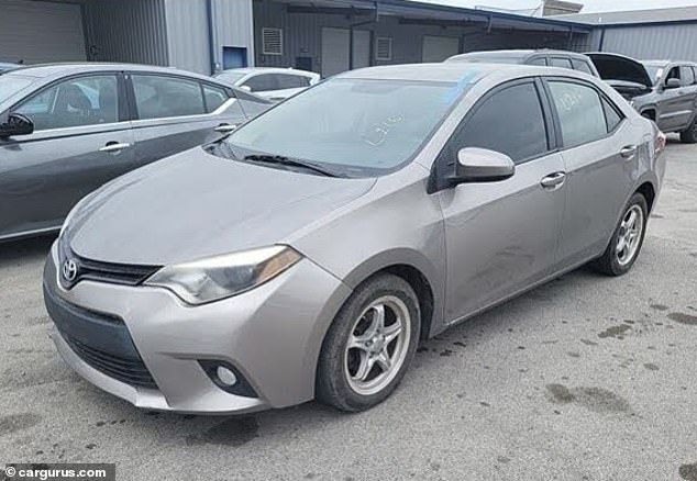 Pictured is a 2014 Toyota Corolla with 247,000 miles. It's on sale at CarGurus for $5,600