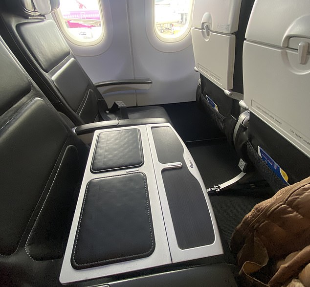 The middle seat of the row is often blocked during short-haul business class flights (as shown above), the mother noted, and she likes to seat her young son in that space.