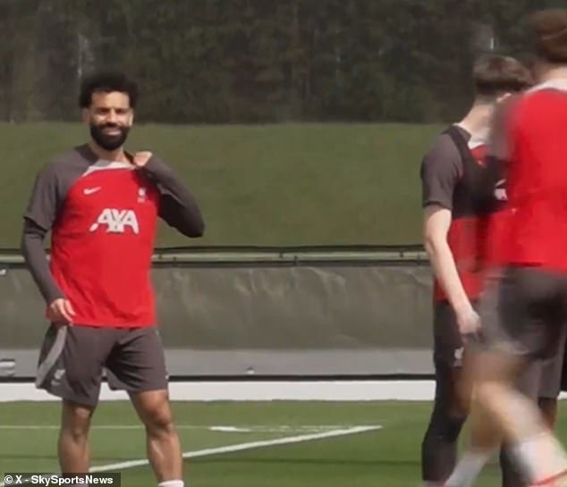 Mo Salah smiled at Liverpool training and appeared to put his dispute with Jurgen Klopp behind him.