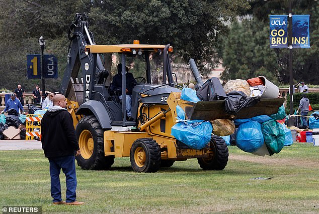 UCLA teams use bulldozer to remove remains from Gaza camp