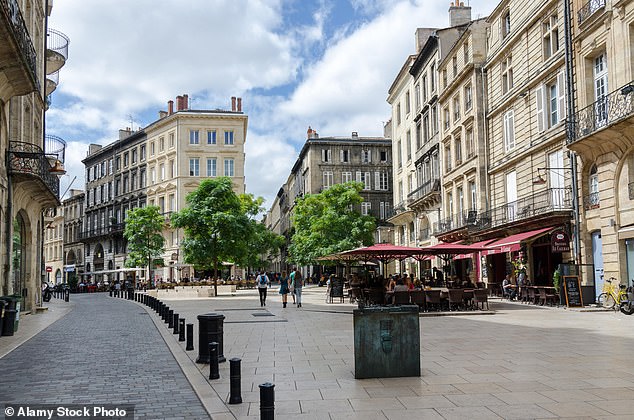 Erica lives in Bordeaux, France. Pictured is an archive image of the Place du Palais in the city.