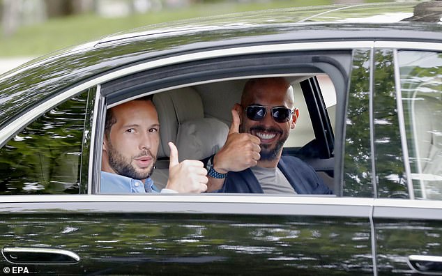 Former professional kickboxer and social media influencer Andrew Tate (right) is pictured today with his brother Tristan.