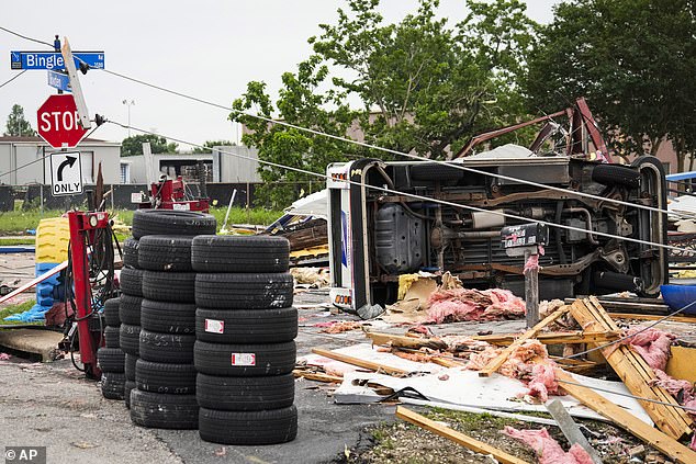 U.S. Postal Service truck rolls over on its side at Bingle and Sowden intersection in Houston