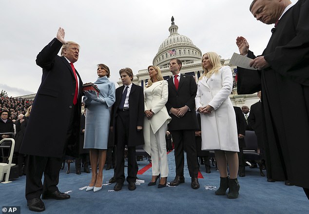 Barron Trump (center) with his mother Melania (left) and siblings Ivanka, Eric and Tiffany as Donald Trump is sworn in as president in January 2017.