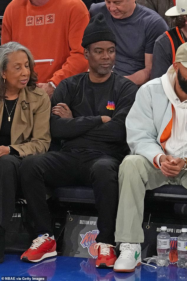 Chris took his mother Rosalie Rock to the basketball game.