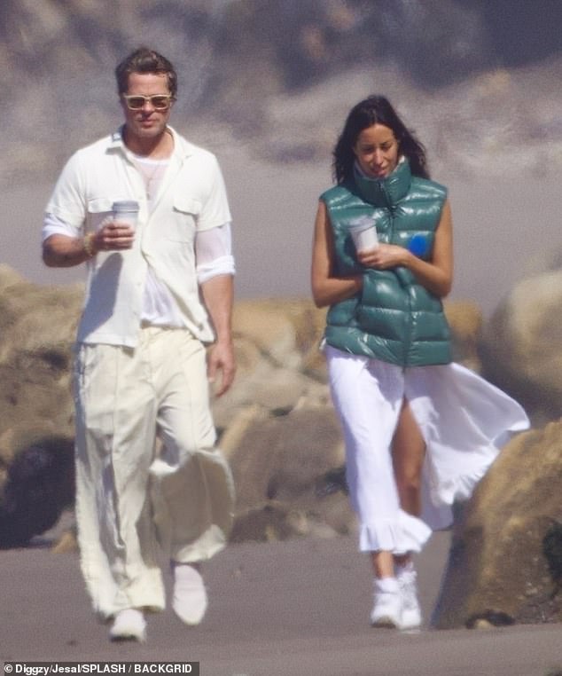 Brad Pitt and his girlfriend Inés de Ramón enjoyed a romantic morning walk on the beach on Monday.