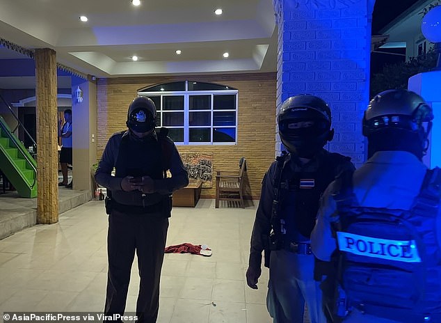 Thai police are seen at the scene of the attack, a pool villa where a party took place on May 26.