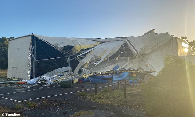 Dramatic images from the scene show how the roof and part of a wall have been severely damaged by strong winds.