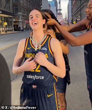 The 21-year-old wore pennants Nos. 1 and 17. She was selected with the first overall pick in the WNBA Draft last month and wore No. 17 at Iowa.