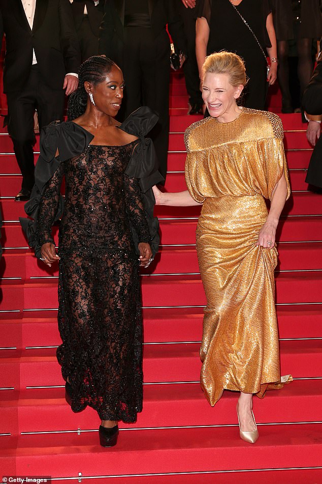 Cate was joined on the red carpet by her co-star Nikki Amuka-Bird, 48, (left), who cut a glamorous figure in a sheer black lace dress.