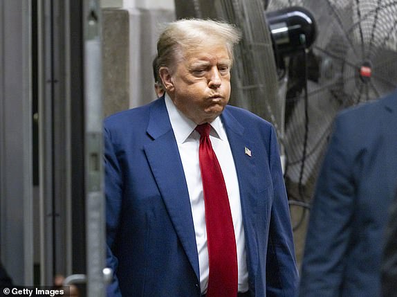 NEW YORK, NEW YORK - APRIL 30: Former US President Donald Trump returns to the courtroom after a break during his trial for allegedly covering up hush money payments in Manhattan Criminal Court on April 30, 2024 in New York City.  Former US President Donald Trump faces 34 felony counts of falsifying business records in the first of his criminal cases to go to trial.  (Photo by Justin Lane-Pool/Getty Images) *** BESTPIX ***
