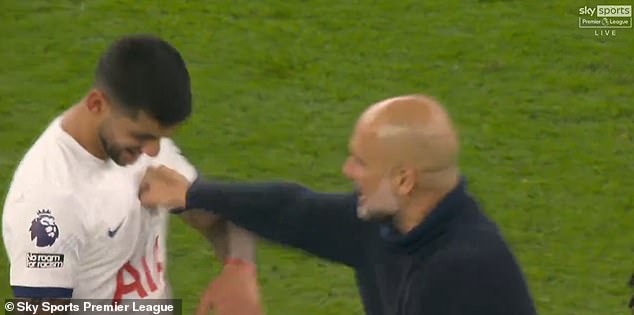 Manchester City manager Guardiola (right) playfully punched Romero (left) in the chest at full-time.