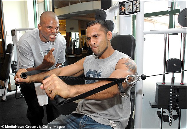 Run DMC's Darryl McDaniels (left) works out with JAM'N 94.5's Ramiro (right) at an Equinox gym on Dartmouth Street in Boston.