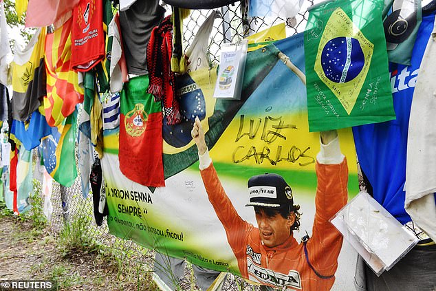 Tributes to Ayrton Senna adorned the gates of the Imola circuit on the 30th anniversary of his death