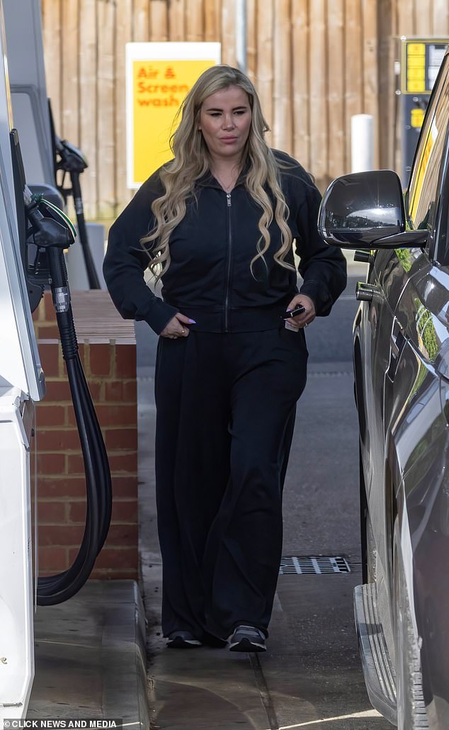 Georgia Kousoulou looked tense as she stepped out in Essex on Wednesday after her husband Tommy Mallet admitted that 