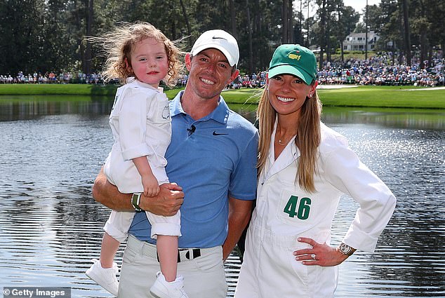 McIlroy is seen with his wife Erica Stoll and daughter Poppy a year ago at the 2023 Masters