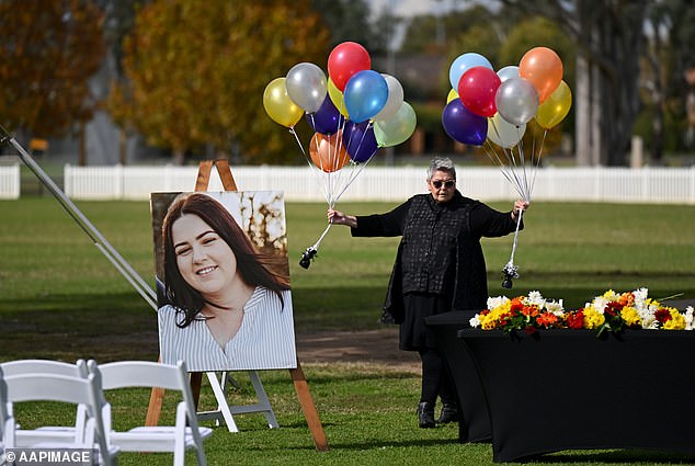 A photograph of Molly Ticehurst is seen before a funeral at Forbes Rugby Union Grounds.