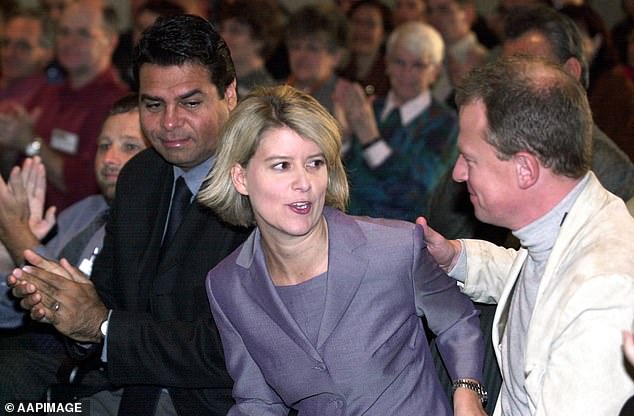 Pictured: Natasha Stott Despoja is congratulated by her then-fiancé Ian Smith after giving a speech at the Democratic conference in Canberra in 2002. The couple married the following year.