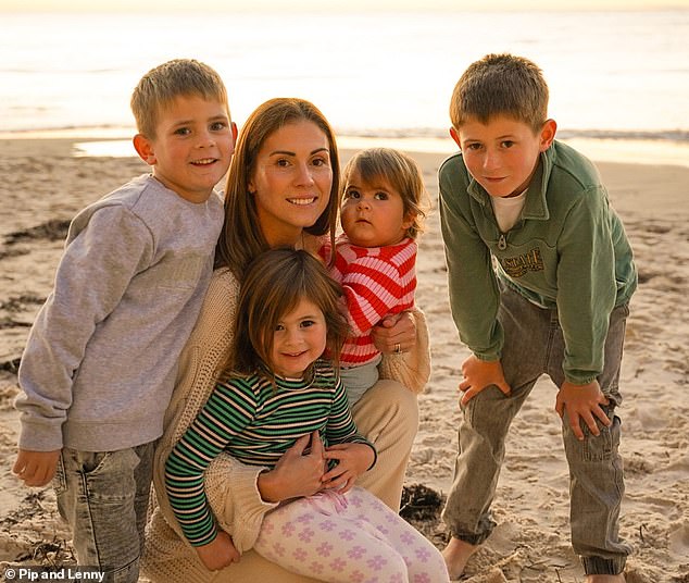 Justine (seen here with her family) may have to close the baby clothing business she co-owns due to a Facebook hacker attack.
