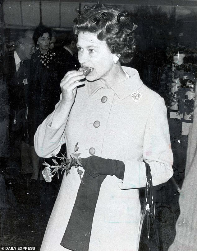 The Queen photographed eating a strawberry in 1977, the year of her successful Silver Wedding.