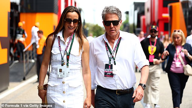Hugh Grant kept cool in a white shirt and sunglasses as he arrived at the Formula One Grand Prix with his wife Anna Eberstein on Sunday.