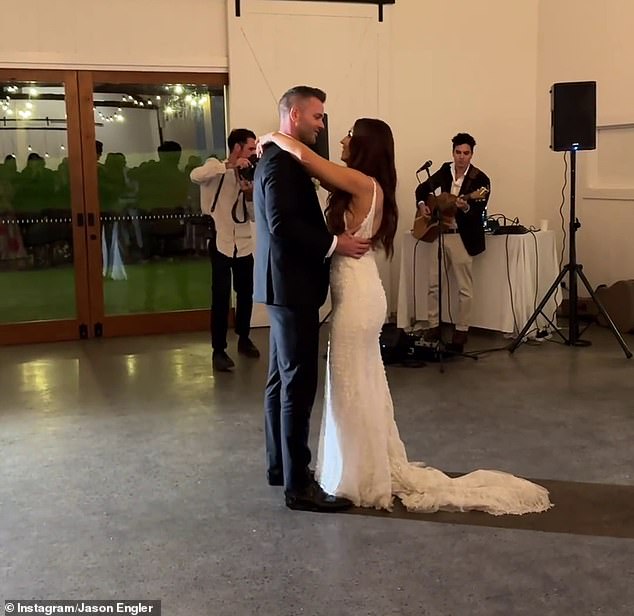 Claire looked every inch the blushing bride in a flowing white wedding dress with embroidered details and a dramatic train (pictured during her first dance).