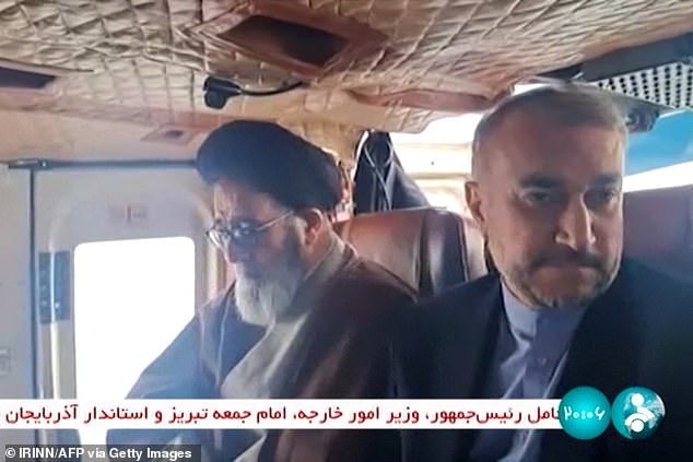 Iranian President Ebrahim Raisi (left) was photographed moments before the helicopter crash near the border with Azerbaijan that put his 