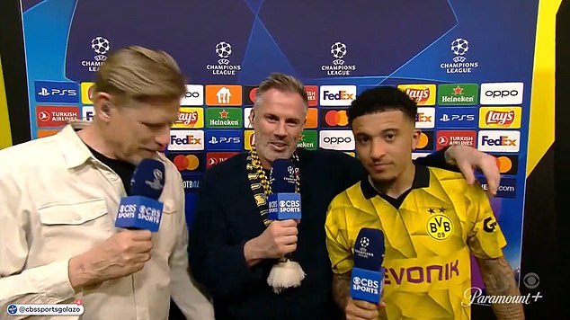 Jamie Carragher (centre) hilariously interviews Borussia Dortmund's Jadon Sancho (right) after 