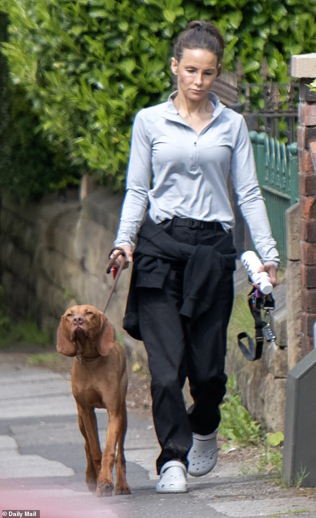 The Repair Shop star Jay Blades' Lisa Marie Zbozen, 43, looked somber when she was spotted walking dogs near her sister's house in Nottinghamshire on Sunday.