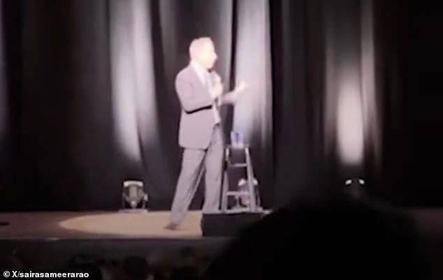 Pictured: Seinfeld on stage in Norfolk, Virginia, during the fight between a protester and an audience member. TMZ reported that he said people shouldn't boo protesters because they have a right to protest.