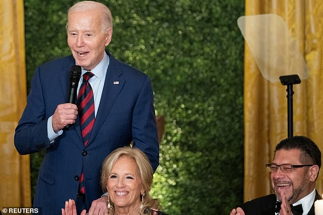 President Joe Biden (left) crashed first lady Jill Biden's (center) state Teachers of the Year dinner, which was being held in the East Room on Thursday night.  The appearance was not on his public agenda.