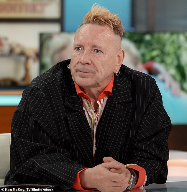 Sex Pistols icon John Lydon cried on stage on Thursday as he spoke about the final moments of his beloved wife Nora Forster (pictured in 2023).