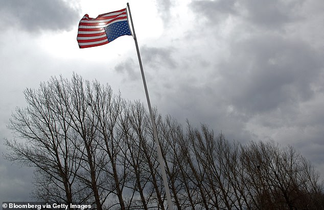 The inverted flag (file photo) has been used as a sign of support for former President Donald Trump's false claims that the 2020 election was stolen from him.