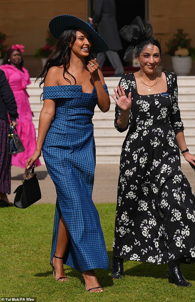 Maya laughed as she chatted with her friend after greeting the royal.