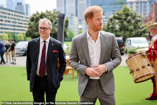 Invictus Games Foundation CEO Dominic Reid (left) and Prince Harry at the Honorable Artillery Company in London on May 7.