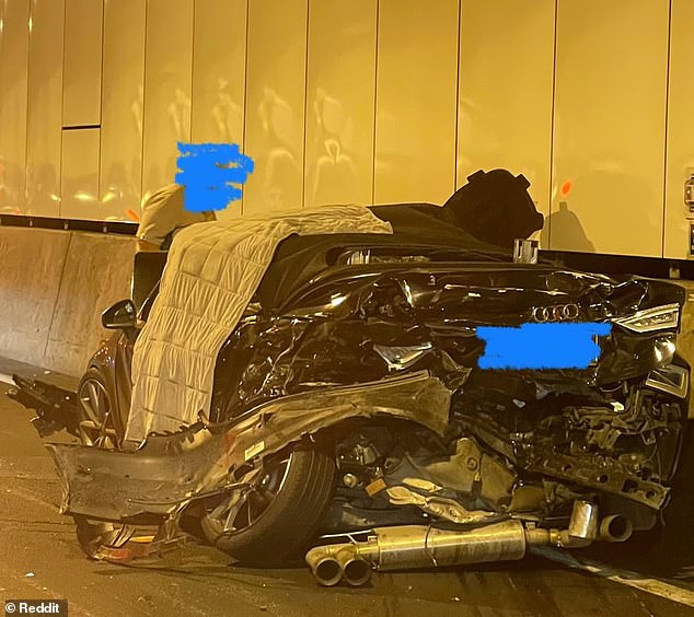 Two people died in a horror multi-vehicle crash (pictured) in Brisbane's Legacy Way tunnel on Wednesday.